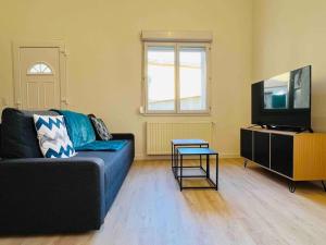 TV a/nebo společenská místnost v ubytování Sun Mezzanine