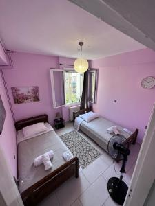 Postel nebo postele na pokoji v ubytování Olia apartment