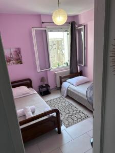 Postel nebo postele na pokoji v ubytování Olia apartment