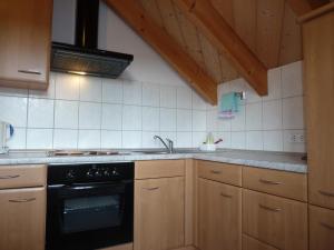 Kuchyň nebo kuchyňský kout v ubytování Gästehaus Hoffmann