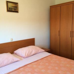 Postel nebo postele na pokoji v ubytování Apartments Pisac