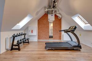 Waterlane Vintage - Fitness & Parking by Downtown Apartments tesisinde fitness merkezi ve/veya fitness olanakları