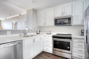 Η κουζίνα ή μικρή κουζίνα στο Santana Row 2br w gym pool nr highways SFO-1326