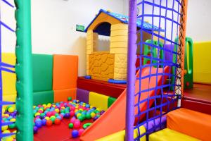 a childrens play room with a colorful play set at Kacha Resort & Spa, Koh Chang in Ko Chang