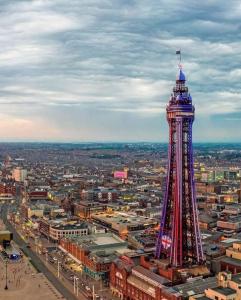 an image of the eiffel tower in a city at Windsor House Hotel in Blackpool