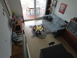 A seating area at GMID IMMO A187 Apartamento Port Canigo