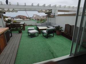 A balcony or terrace at GMID IMMO A187 Apartamento Port Canigo
