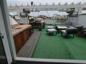 A balcony or terrace at GMID IMMO A187 Apartamento Port Canigo
