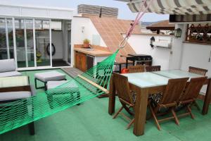 A patio or other outdoor area at GMID IMMO A187 Apartamento Port Canigo