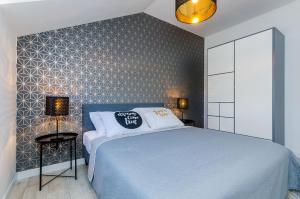Posteľ alebo postele v izbe v ubytovaní Apartment Sea Shell