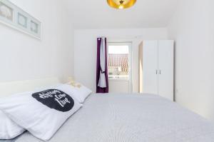 Posteľ alebo postele v izbe v ubytovaní Apartment Sea Shell