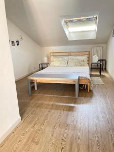Postel nebo postele na pokoji v ubytování Roof Pellegrini