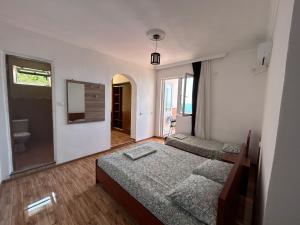 Letto o letti in una camera di My House Kvariati