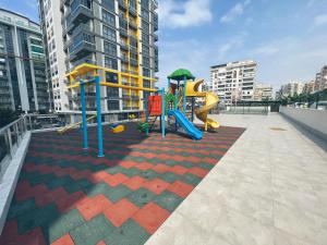 a playground on the roof of a building at 70qm Apartment in Alanya, 2 Zimmer, Strandnähe in Alanya