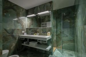 Ванная комната в Olivi Hotel & Natural Spa