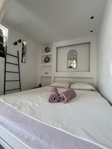 Posteľ alebo postele v izbe v ubytovaní Papyrus City Centre Apartments