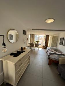 Posteľ alebo postele v izbe v ubytovaní Papyrus City Centre Apartments