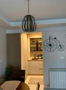 Kuchyň nebo kuchyňský kout v ubytování Apartman Get Rest