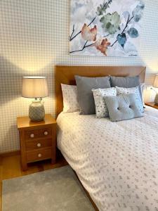 Ένα ή περισσότερα κρεβάτια σε δωμάτιο στο Andainas A