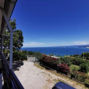 a view of the ocean from the balcony of a house at Studio Vesna & Žan in Koper