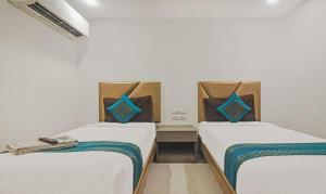 Postel nebo postele na pokoji v ubytování Hotel SSR GRAND