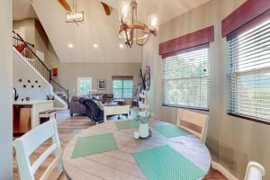 a dining room and living room with a dining table at Blue Ridge Delight in Clayton
