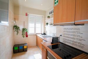 Kuchyň nebo kuchyňský kout v ubytování Alameda Apartments & Rooms + 15 fotografií