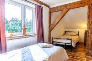 Afbeelding uit fotogalerij van Zakątek Szczęścia Eko Agroturystyka in Kiwity