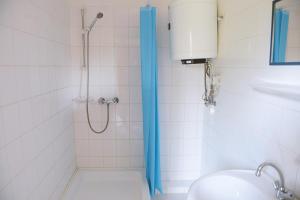 Koupelna v ubytování Szegedi Partfürdő Kemping és Apartman
