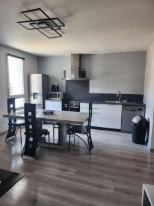 Η κουζίνα ή μικρή κουζίνα στο Appartement sandonato