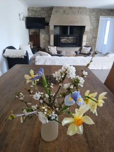 Postel nebo postele na pokoji v ubytování La Ferme de Penanguer
