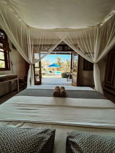 Letto o letti in una camera di Two Smiling Buddhas