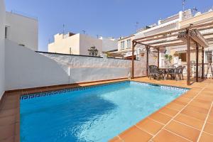 Bazén v ubytování Vivienda con piscina nebo v jeho okolí