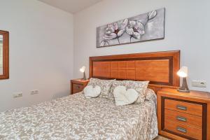 Postel nebo postele na pokoji v ubytování Vivienda con piscina