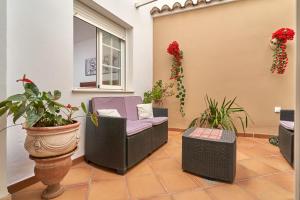 Posezení v ubytování Vivienda con piscina