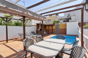 Balkón nebo terasa v ubytování Vivienda con piscina