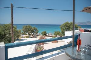 a view of the ocean from a balcony at Deep Blue in Agios Prokopios