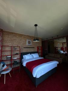 Postel nebo postele na pokoji v ubytování 10inn Boutique Hotel