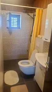 Ванна кімната в Apartment Kata