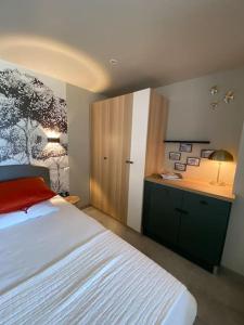 Letto o letti in una camera di LIS ESTELLO - Gîte à FLAYOSC VAR