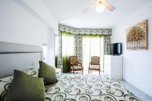 Et opholdsområde på Fabulous new 2 bedroom apartment in Costa Adeje