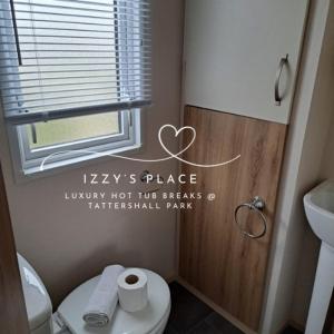 Ένα μπάνιο στο Izzy’s Place at Tattershall Lakes