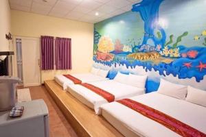 Sjónvarps- og/eða afþreyingartæki á Fumigate Hotel