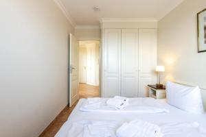 Ein Bett oder Betten in einem Zimmer der Unterkunft Appartement Kleeblatt