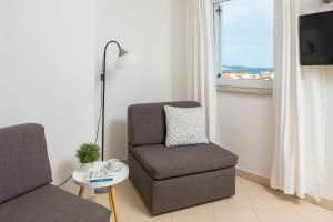 TV a/nebo společenská místnost v ubytování Sea View Apartments Tihi II
