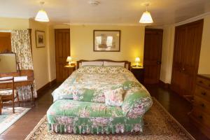 Ένα ή περισσότερα κρεβάτια σε δωμάτιο στο Lagafater Lodge