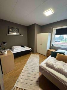 Ένα ή περισσότερα κρεβάτια σε δωμάτιο στο Fantastisk eiendom med flott utsikt