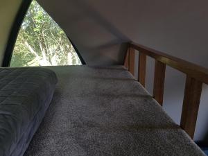 Postel nebo postele na pokoji v ubytování Glamorous Glamping