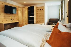 Posteľ alebo postele v izbe v ubytovaní Hotel Edelweiss Superior