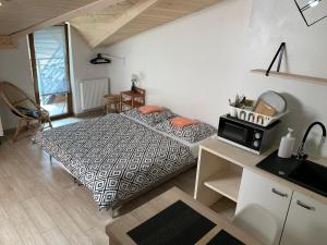 Кровать или кровати в номере Noclegi Zakopane Krzesanica